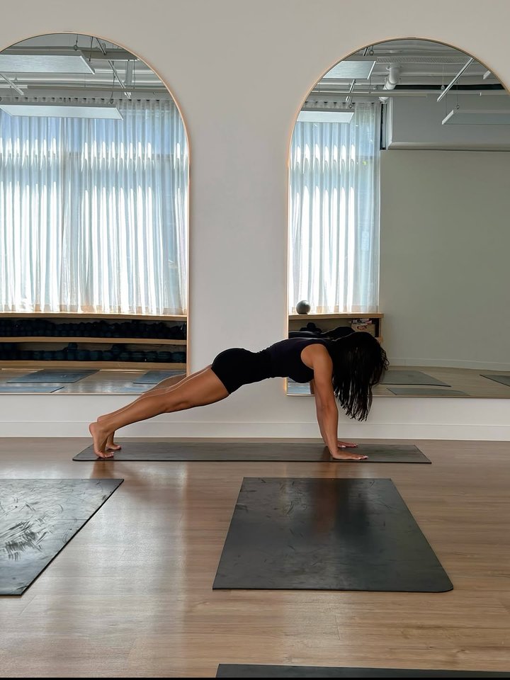 Plank series on a mat in a bright studio
